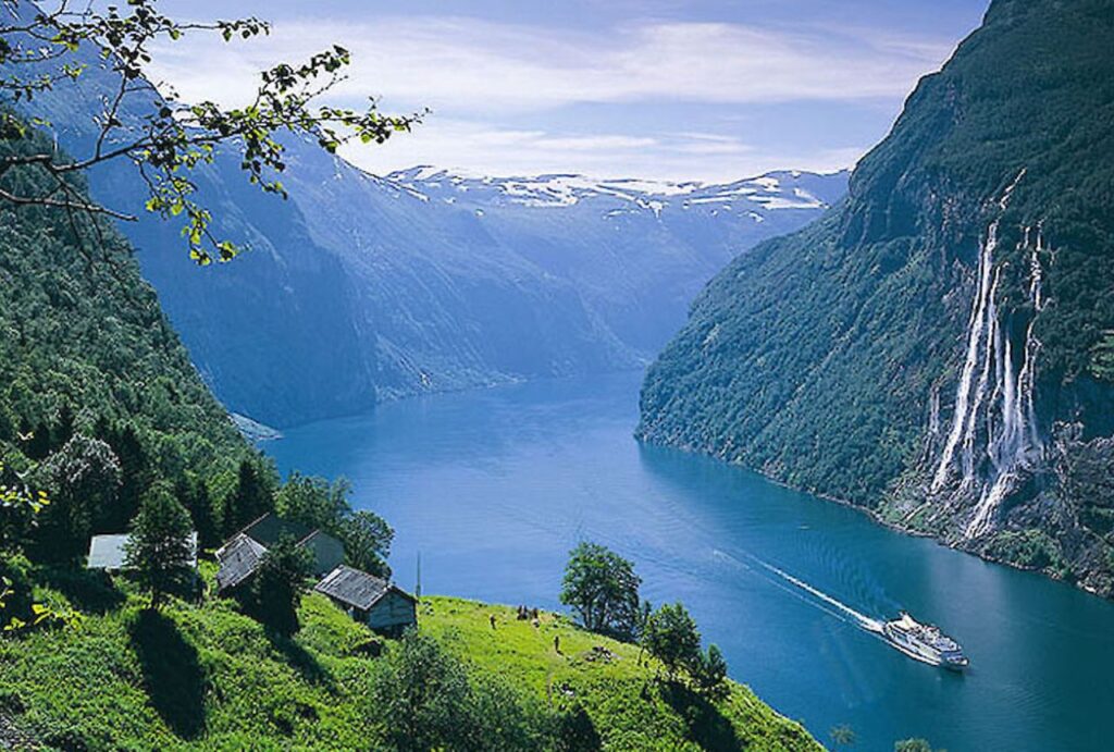 Sail through the stunning beauty of the Geiranger Fjord on a scenic cruise