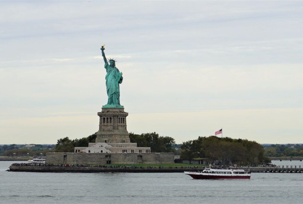 Take a ferry to Liberty Island to witness the iconic Statue of Liberty